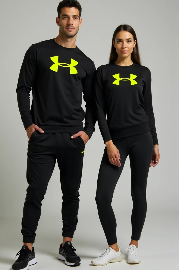 General image of a man and woman wearing black long-sleeved sports outfits and leggings with a lemon green H logo