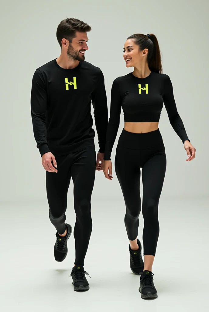 General image of a man and woman wearing black long-sleeved sports outfits and leggings with a lemon green H letter logo