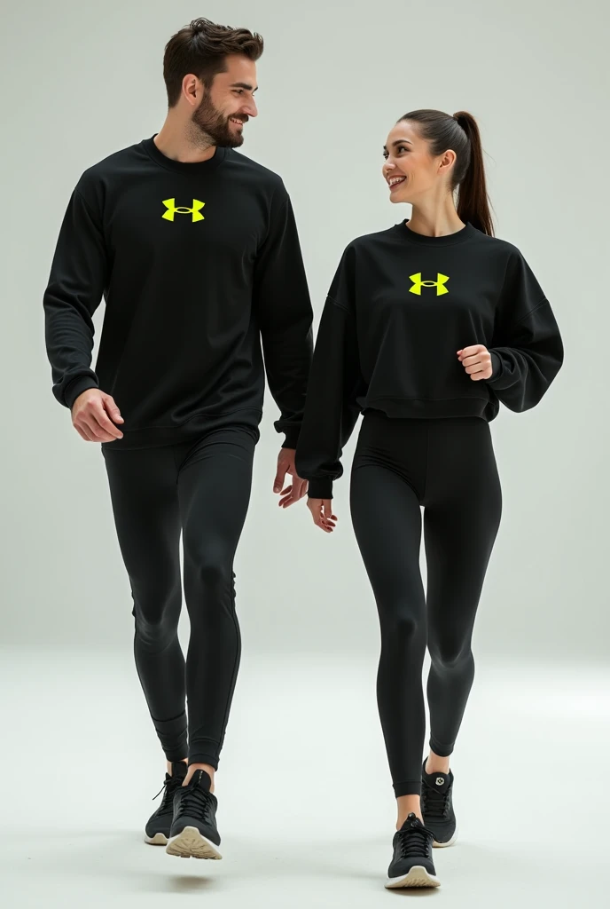 General image of a man and woman wearing black long-sleeved sports outfits and leggings with a lemon green H letter logo