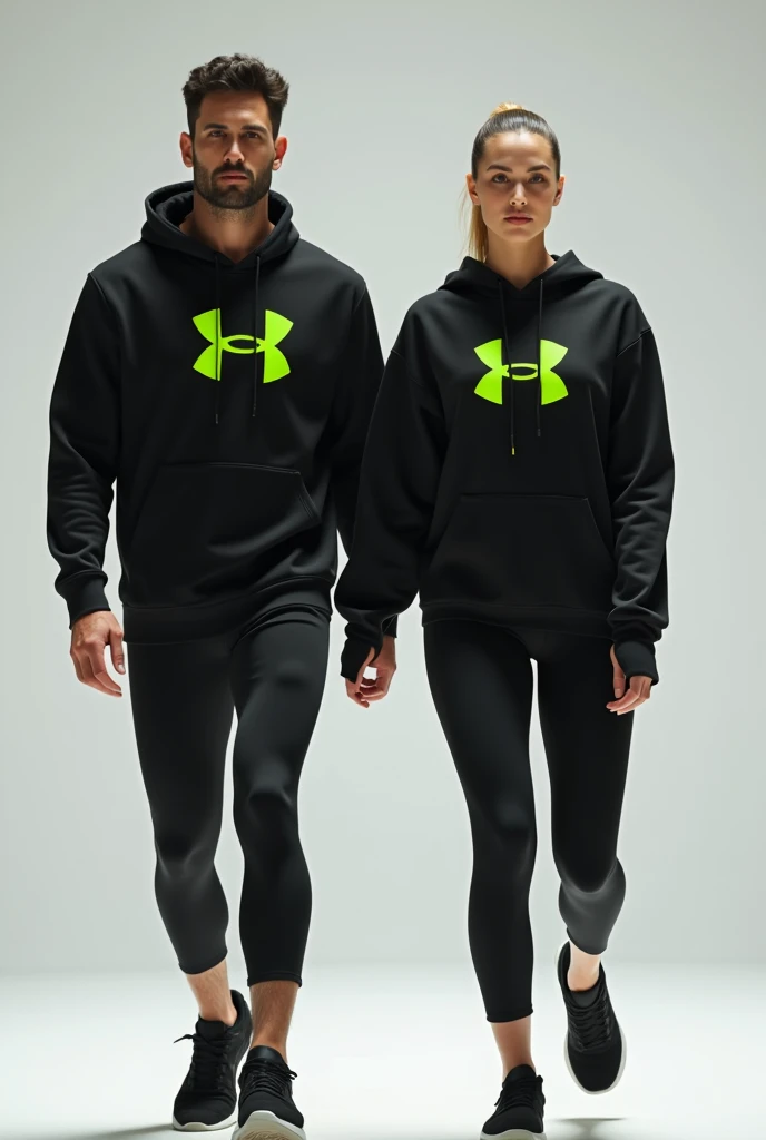 General image of a man and woman wearing black long-sleeved sports outfits and leggings with a lemon green H letter logo