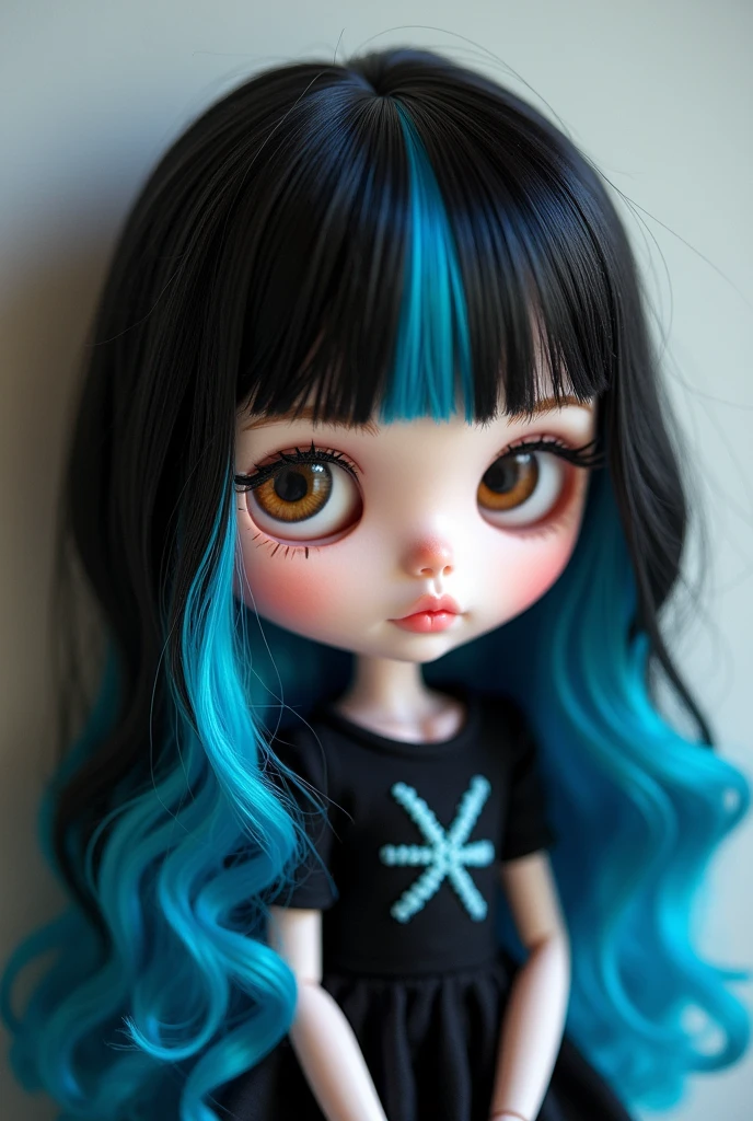A blythe doll with black hair with blue streaks, white, and with brown eyes,