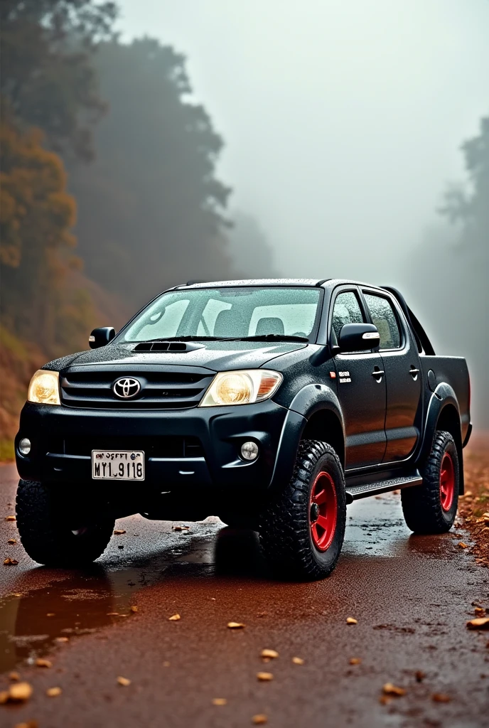 A 2006 Toyota Hilux Vigo SRV Vigo, 1KD engine, black, double cabin and red rims
