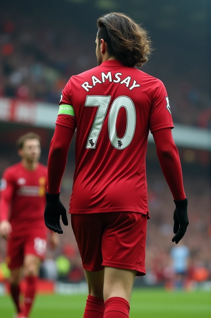 Liverpool player called Ramsay who wears number 70, long sleeves, black gloves and wavy hair up the community shield seen from behind