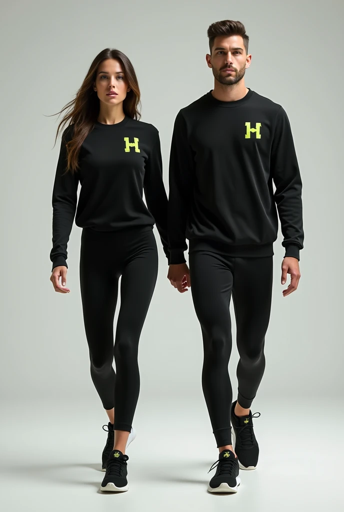 General image of a man and woman wearing black long-sleeved sports outfits and leggings with a lemon green H letter logo