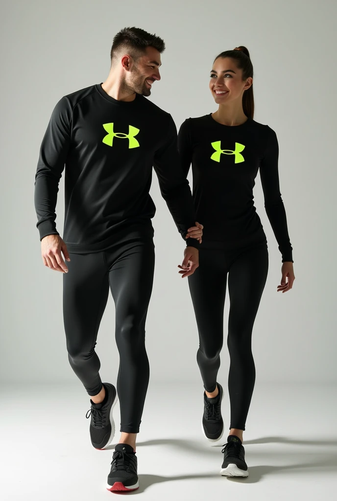 General image of a man and woman wearing black long-sleeved sports outfits and leggings with a lemon green H letter logo