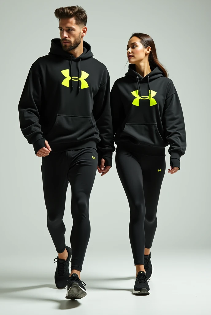 General image of a man and woman wearing black long-sleeved sports outfits and leggings with a lemon green H letter logo