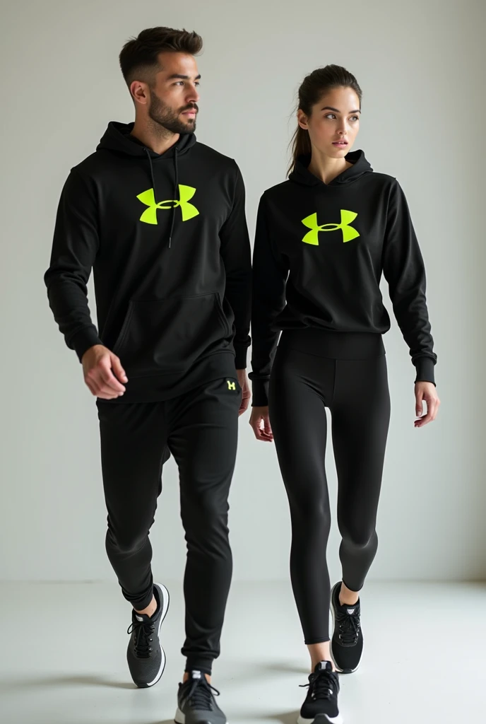 General image of a man and woman wearing black long-sleeved sports outfits and leggings with a lemon green H letter logo