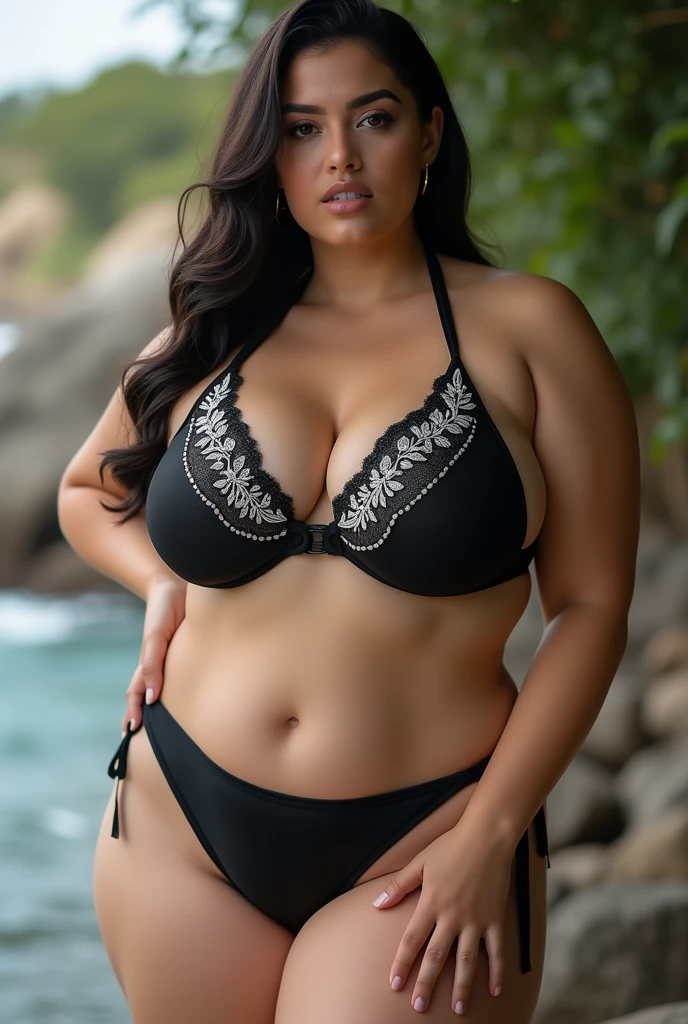 White skinned woman with 75cm diameter tits in black bikini with white embroidery.