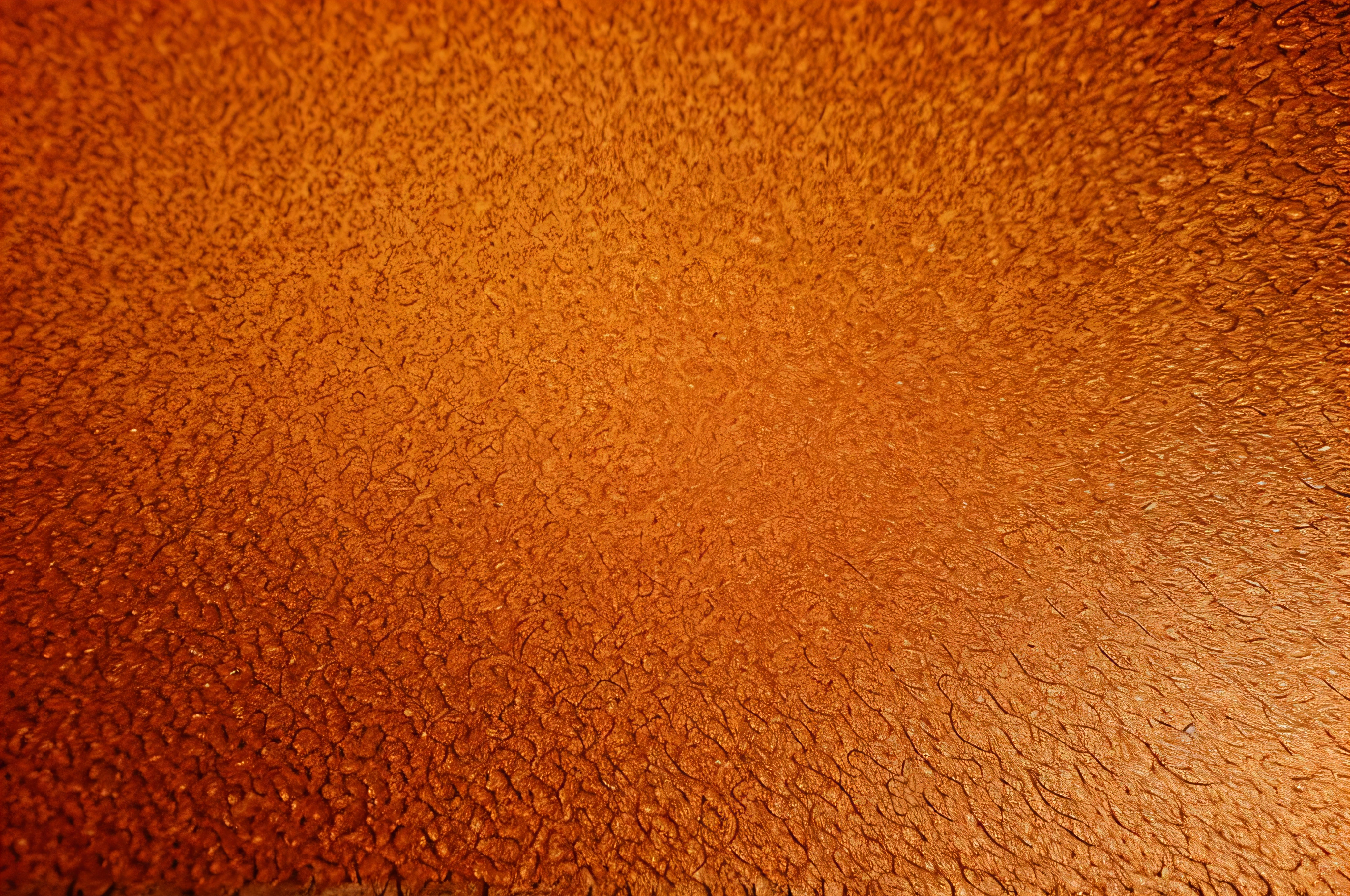 texture of bright orange paper as background