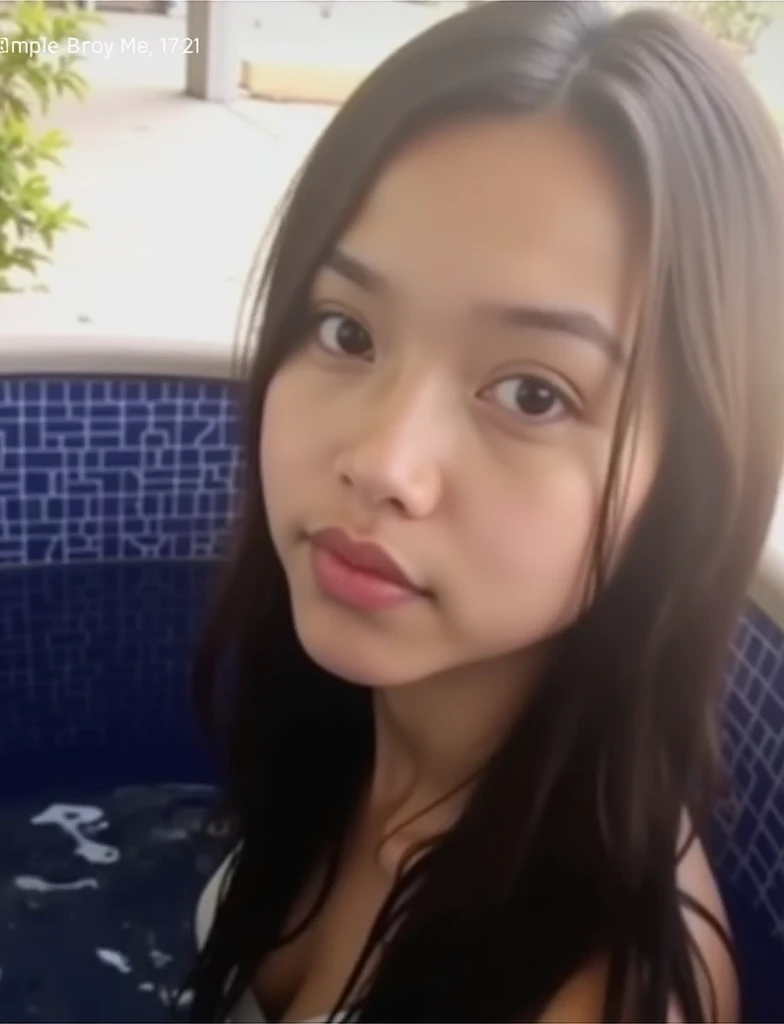 Naked girl sitting in the pool showing her 15 year old breasts
