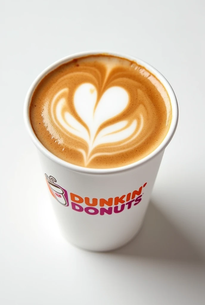 A latte heart coffee shot from a top angle, zoomed in, with milk, in a white cup plastic dunkin donut