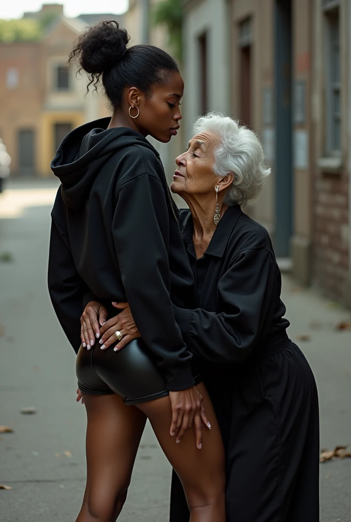 black woman hair in a bun black hoodie black leather short shorts a old grandma in a dress on her knees kissing her ass behind her squeezing her butt