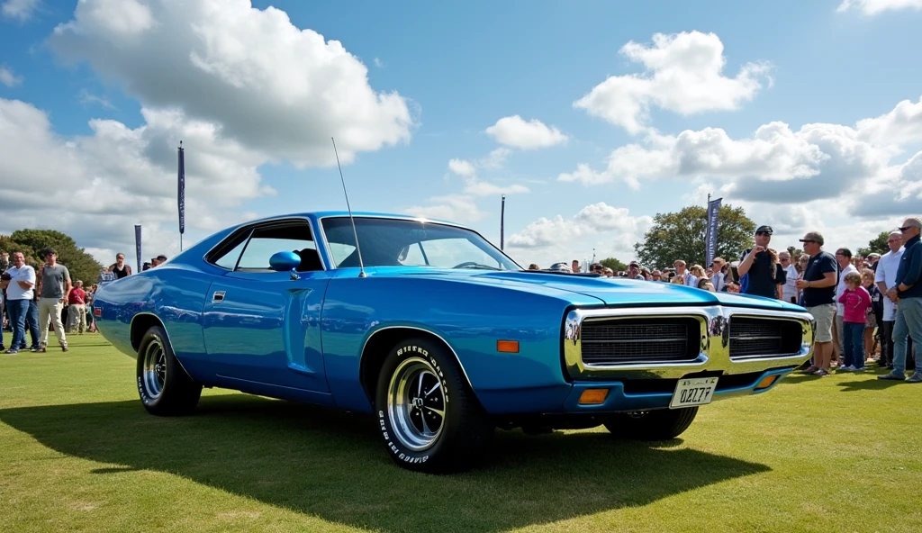 73 valiant charger electric blue at the Goodwood festival with a sunny day, wispy white clouds