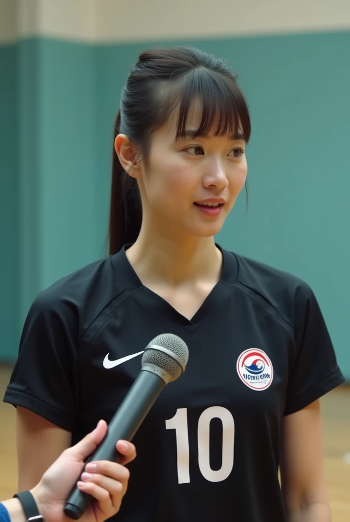 Korean women's volleyball player. fair skin. high nose, ponytailed hair, using plain black jersey no. 10. holding a mic being interviewed facing the camera in the volleyball practice room