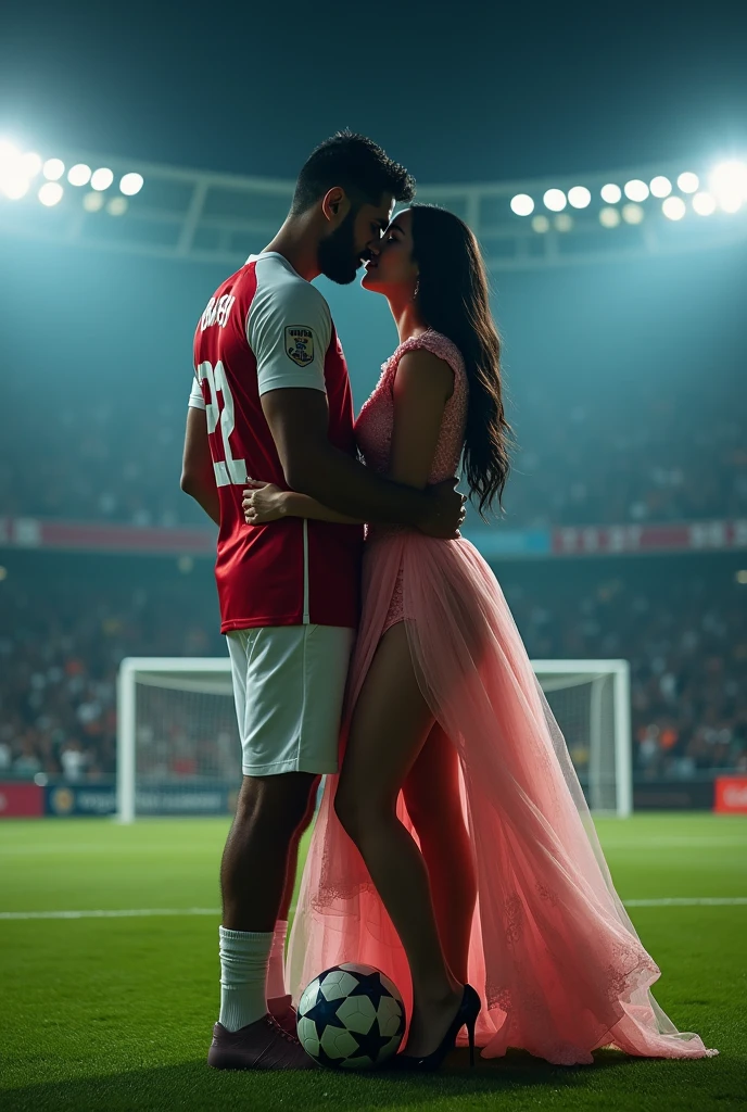 A man and woman kissing eachother in football stadium ground at night time all spot light on them woman is wearing glasses and had black hair . Woman is wearing long pink dress high heels . Man is wearing white and red colour 32 number jersey. Siddharth written on jersey. Woman is cupping man s face . Man s one foot resting on a soccer ball. Man is 1 feet taller than woman. Add some audiance in stadium . Make it real .make boy handsome . Make dress long and floral Man 2 feet taller than woman. Jersey number is 32. Add goal net in back ground . Make her hair set in straight  .woman is wearing  glasses make man 2feet taller than woman 
