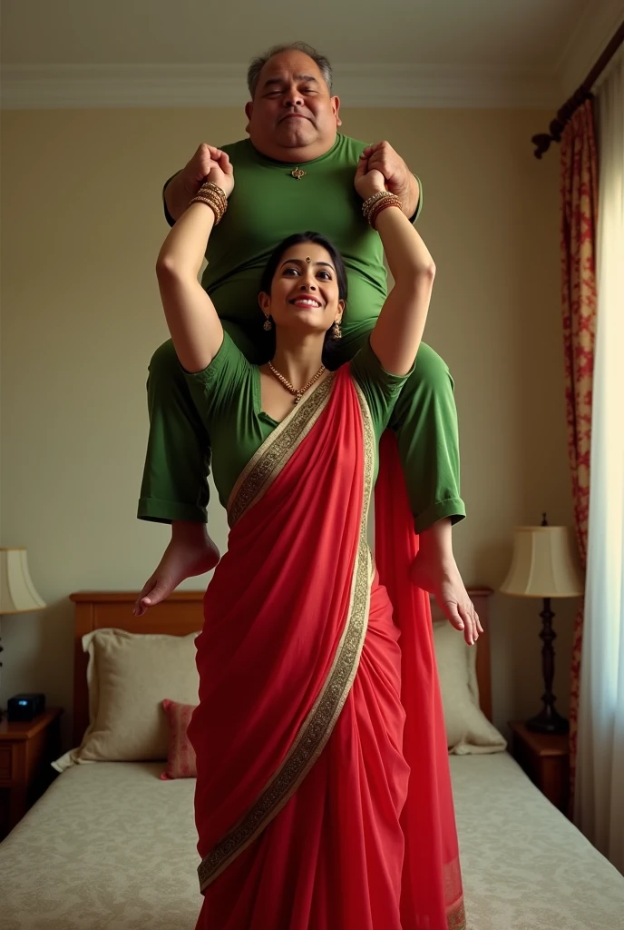 Beautiful and Slim Indian woman Aishwarya Rai in green blouse red saree lifting a large chubby man above her shoulders, man is sitting on woman's shoulders, in a bedroom with high ceiling, natural smile, woman is looking into the camera , full body image 