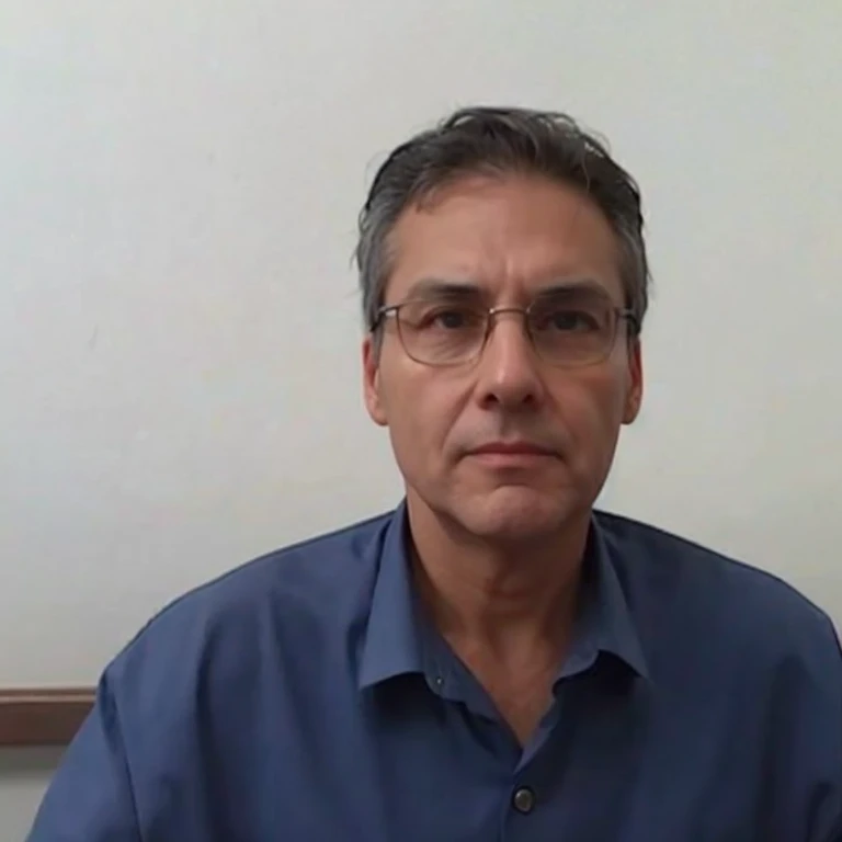 50 year old lawyer in suit and tie