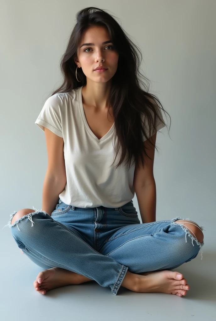 woman wearing jeans with one leg on top of the other