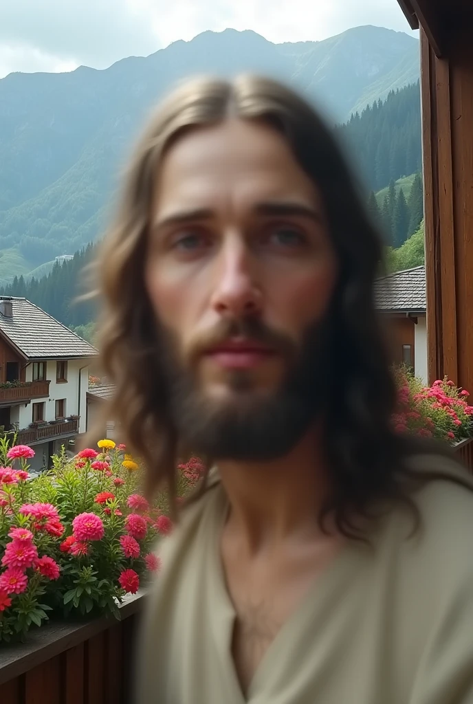 The image shows a blurry portrait in the center with the face of Jesus, making it impossible to describe any specific facial features or details. Around this blurred central area, You can clearly see a charming balcony with wooden railings, Adorned with vibrant flowers and overlooking traditional Alpine-style buildings. The contrast between Jesus' face and the sharp surroundings creates an intriguing focal point.