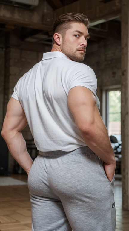 Backshot of a Giant muscular man, 30 years old, mature, glaring at the camera, blue eyes, short blond hair, a full grown blond beard, bulky body, thick arms, thick legs, thick thighs, wearing white polo shirt, grey sweatpants, stocky, wide build, Massive bara man, masculine face, massive butt
