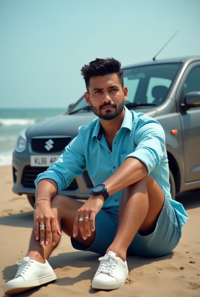 A boy with beard sitting on side of beach. With a sky blue shrt , a shorts, white shoe, he having a watch on his right hang , black strapped digital watch . He wore a silver ring on his right hand middle fingure , in his back side a maruthi susuki wagnor r car with gray colour . The number of car is kl56h4314