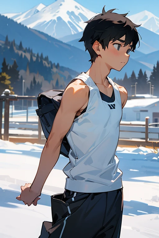 Snowy mountains in the background、An elementary school boy standing wearing a tight white Y-back tank top