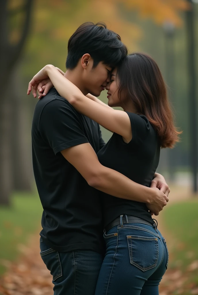 Byun Baekhyun hugging a brunette woman, dressed in black t-shirt and dark blue jeans. The woman's face is hidden, they are in a park