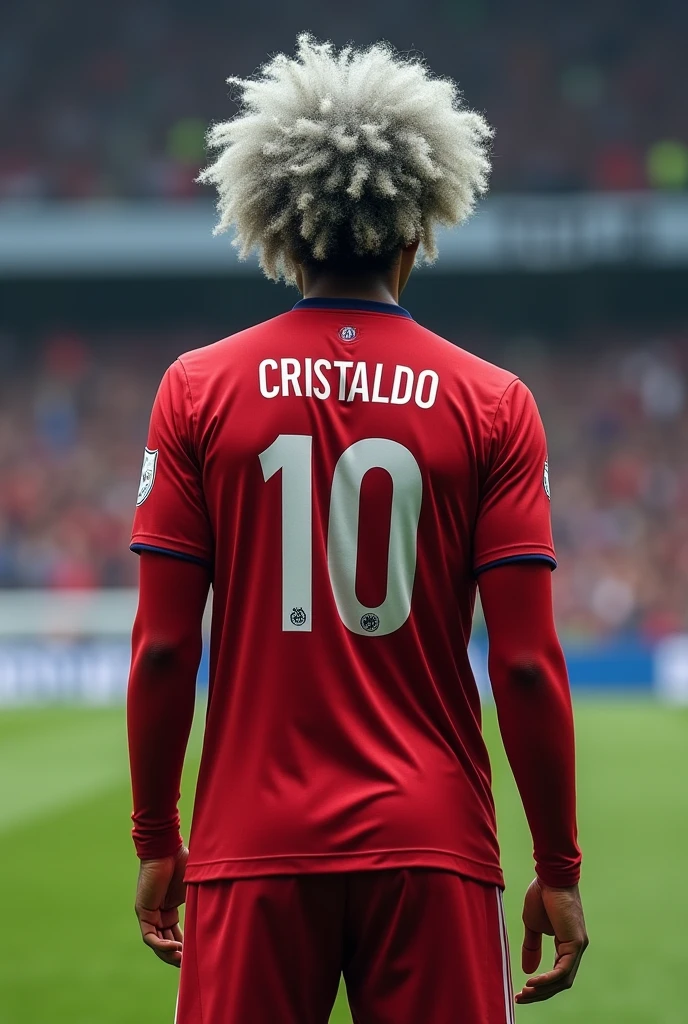 Bayern player who wears number 10 and is called Cristaldo who wears long sleeves and has silver hair and a short afro seen from behind