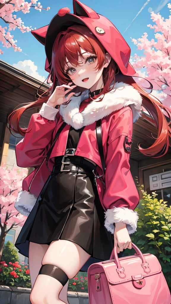Cute red haired girl in a cat costume next to a pink tree