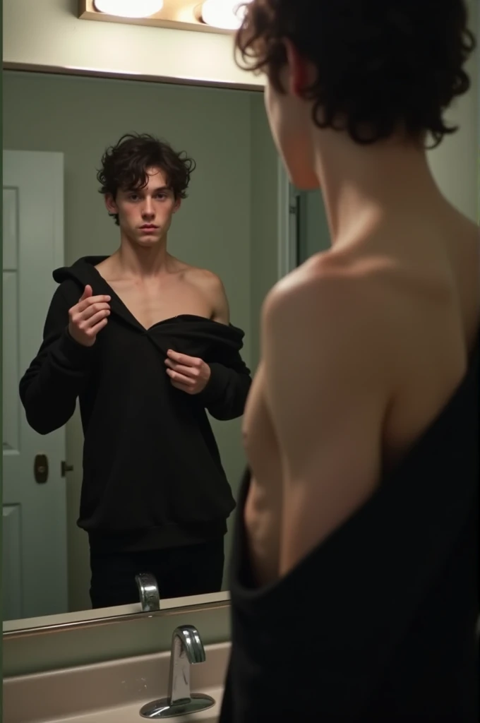 1 man taking a picture in the bathroom mirror with a seductive pose and lifting his black sweatshirt to show his abs discreetly, he is young, has black hair, Finn Wolfhard inspiration and thin and muscular
