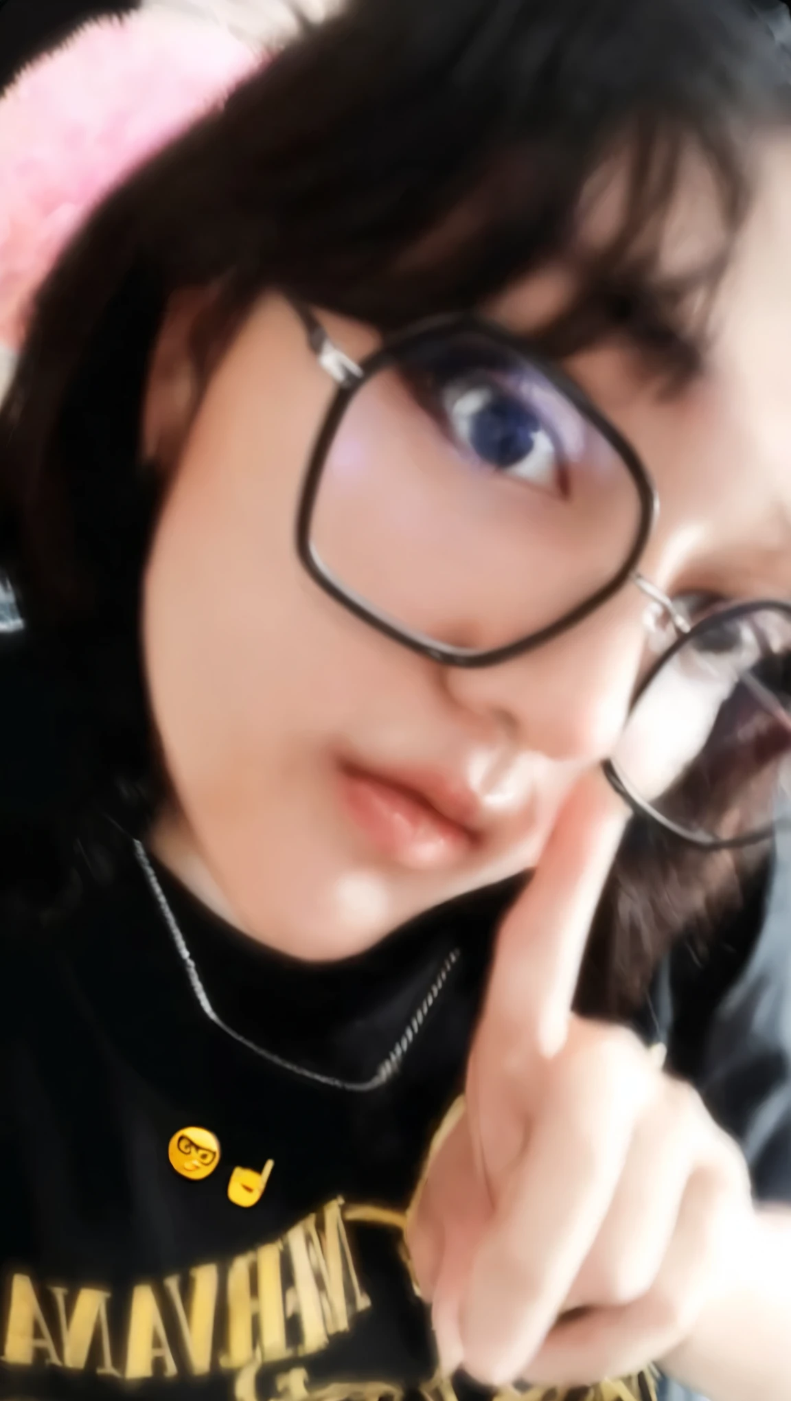 Chinese boy. Features: big eyes + looking straight ahead + holding cell phone + wearing glasses + Voluminous mouth + Defined jawline + striking look