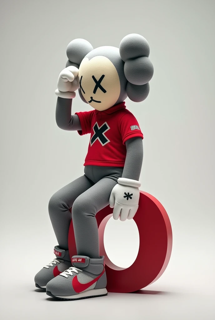 A shot of a gray Kaws style plushie of a seated figure with one leg raised. The figure is sitting sideways and has a large X on the chest. He is dressed in a red and white polo shirt and a pair of Nike sneakers. The background is simple. Sentado encima de la letra "o"mirando hacia la izquierda en posición de lado