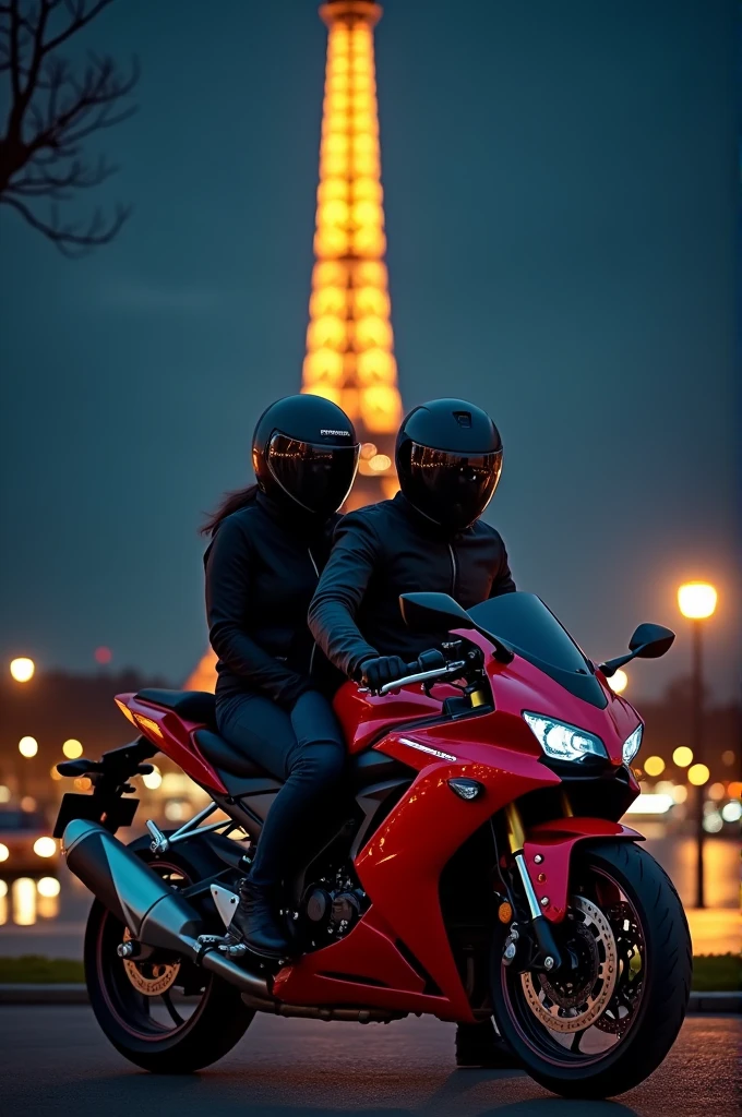 A couple wearing black helmets in Paris at night in front of the Eiffel Tower next to a red Honda 2015 motorcycle