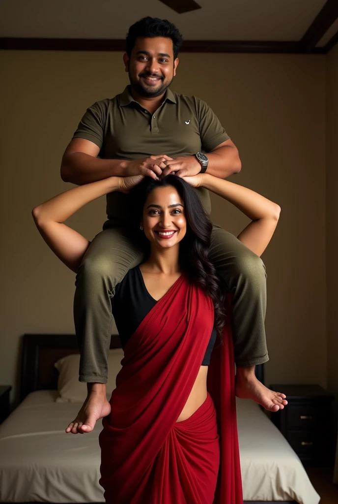 Beautiful and Slim Indian woman Aishwarya Rai in black blouse red saree , lifting a large chubby man above her shoulders, man is sitting on woman's shoulders, natural smile, in a bedroom with high ceiling at night