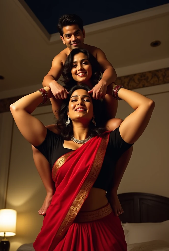 Beautiful and Sexy Indian woman Aishwarya Rai in black blouse red saree , lifting a large chubby man above her shoulders, man is sitting on woman's shoulders, natural smile, in a bedroom with high ceiling at night