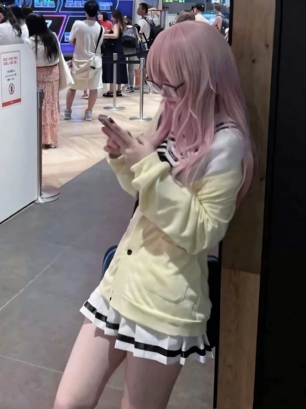 There is a woman sitting on a bench with a camera, very beautiful cute catgirl, ulzzangs, cute kawaii girl, girl with cat ears, Belle Delphine, Anime girl with cat ears, profile image, ruan cute vtuber, sakimichan, real life anime girl, attractive cat girl, profile photo, young and cute girl