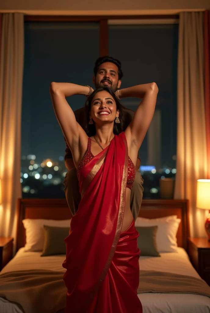 Beautiful and Slim Indian woman Ileana D'Cruz in red silk saree is lifting a large chubby man above her shoulders, man is sitting on woman's shoulders, natural smile, in a bedroom with high ceiling at night