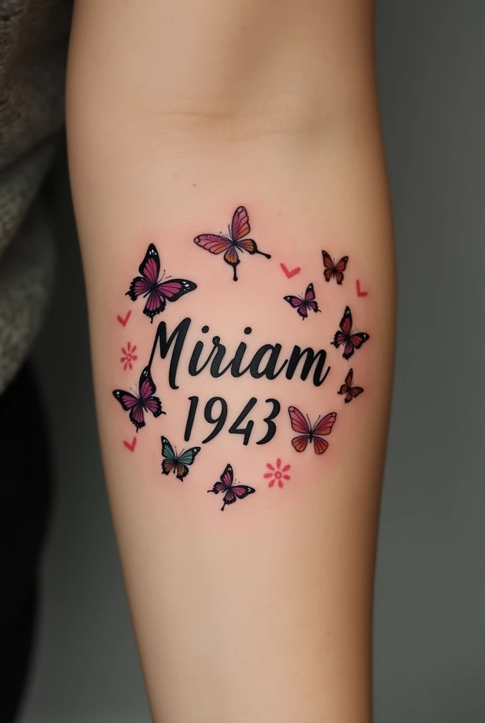 Make the name Miriam and below the date 1943 and have it surrounded by butterflies as a tattoo