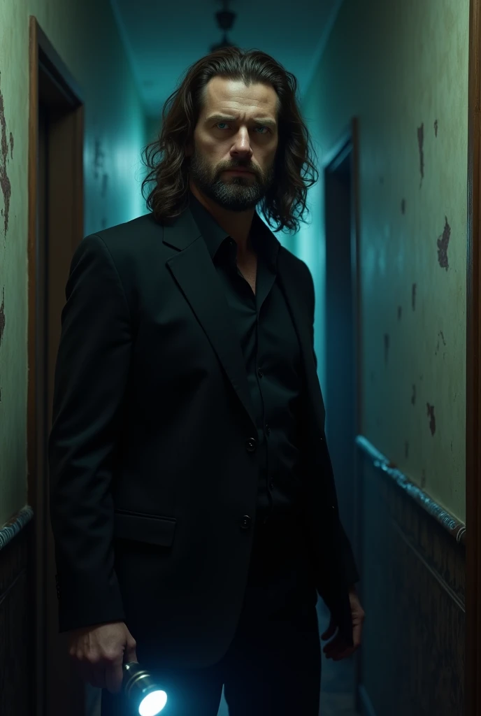 an american man with long brown hair and beard with blue eyes wearing a black suit and holding a flashlight in a hotel with a horror setting