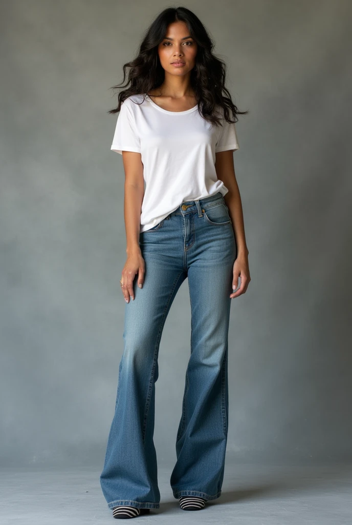 beautiful latin woman, standing straight facing forward,with white t-shirt, denim jeans pants, on a greyish background, cotton t-shirt texture, fitted t-shirt, round neck, striped tights. Medium camera shot.