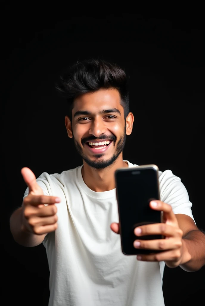 The image shows a young Indian man with hair, smiling and holding up a smartphone and screen of phone is ahead of camera in large image. He is wearing a white t-shirt and appears to be happy and excited. The background is black