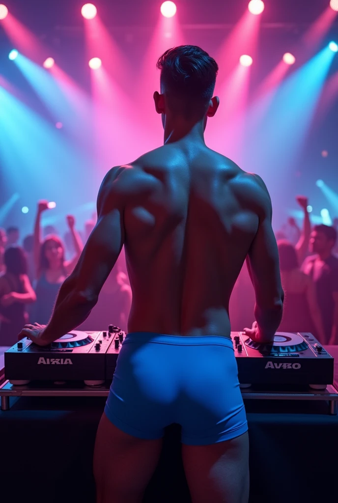 Sexy young guy in boxers djs playing at a party turned backwards [Colored lights] [the boys turned]  [boxer celeste] [seamless boxer]