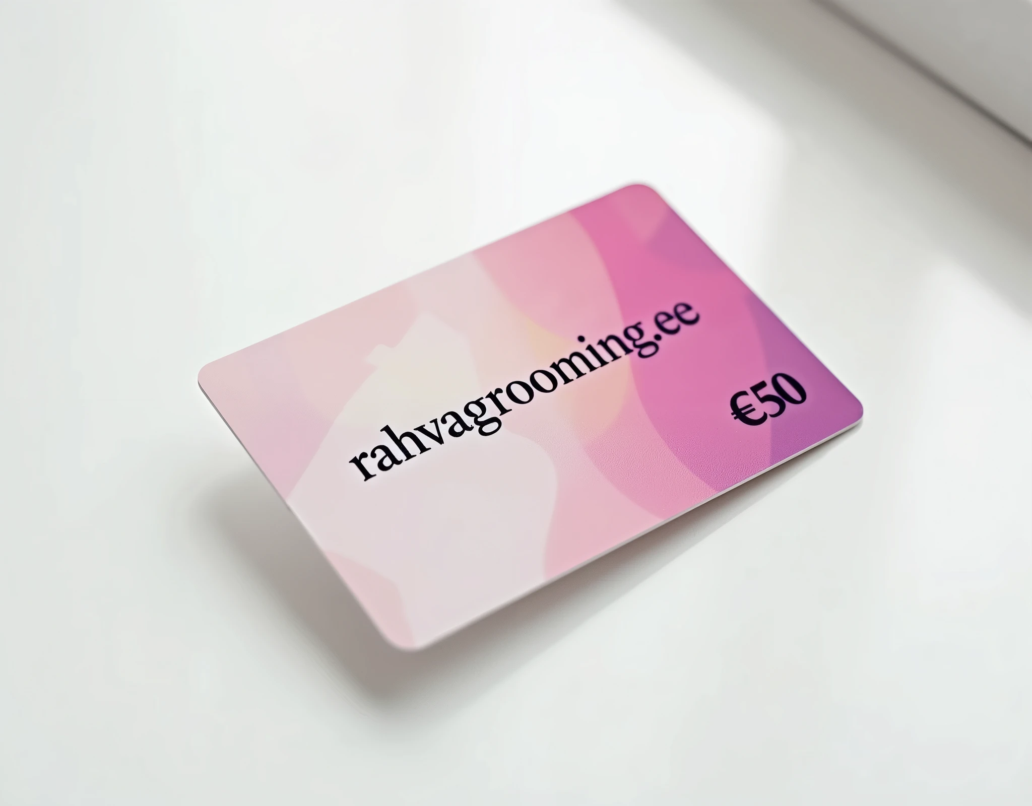 a high quality photograph, a grooming salon gift card lying on a white table, top view, plastic card with bright design and text: "Rahvagrooming.ee", "€50". detailed, photorealistic, 8k, high resolution, professional studio lighting, vibrant colors, smooth textures, sharp focus, intricate details, elegant design, minimalist style, soft shadows, natural reflections, clean and organized composition