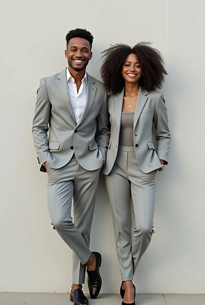man of average height, athletic body, skin fair, short dark brown curly hair, smiling and wearing a light gray suit, leaning against a thin wall. On the other side of the wall a woman of average height, not very athletic body, skin fair, medium dark brown hair CURLY AND TIGHT, smiling and wearing a light gray men's suit, leaning. realistic styling