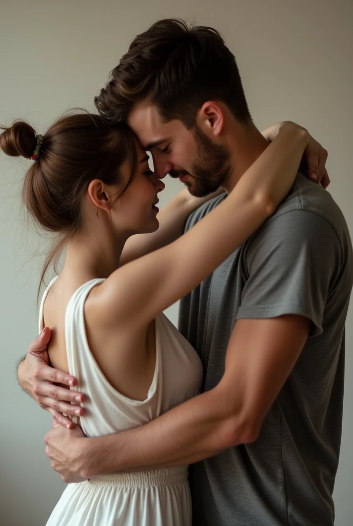 Woman and man, hug is done by pressing the chests together and engulfing the back of the other person with the arms.
