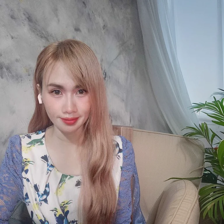 arafed woman Have long hair and a blue dress sitting on a couch, Lalisa Manoban, cute vtuber house, Leaked images, Sakimi-chan, Thai anime girl, Have long hair, Cindy Avelino, with bangs, Sakimi-chan, 2 , with a round face, with a precise face, 🤤 Portrait of a young woman
