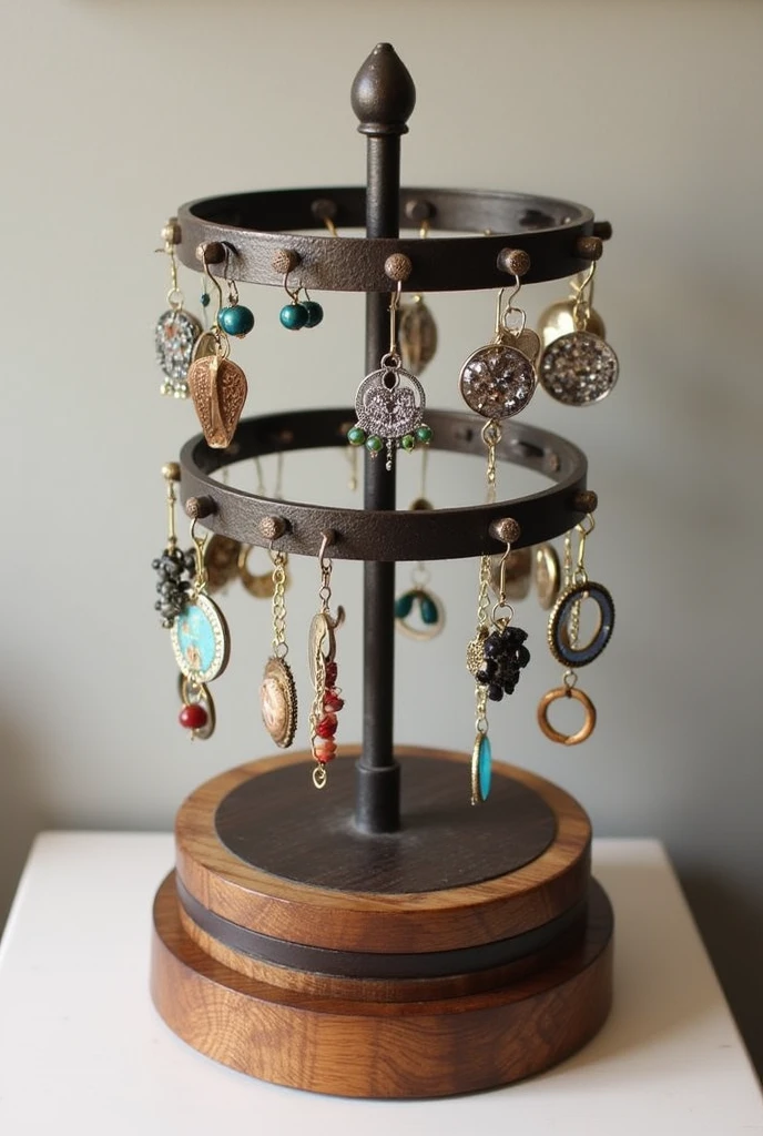 You can create a rotating jewelry display out of wood and iron with three levels for earrings with samples and a bracelet holder