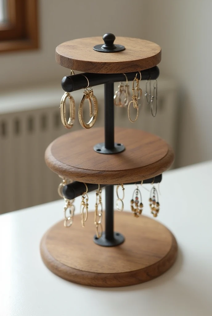 You can create a three-tiered rotating jewelry display out of wood and iron for earrings with samples