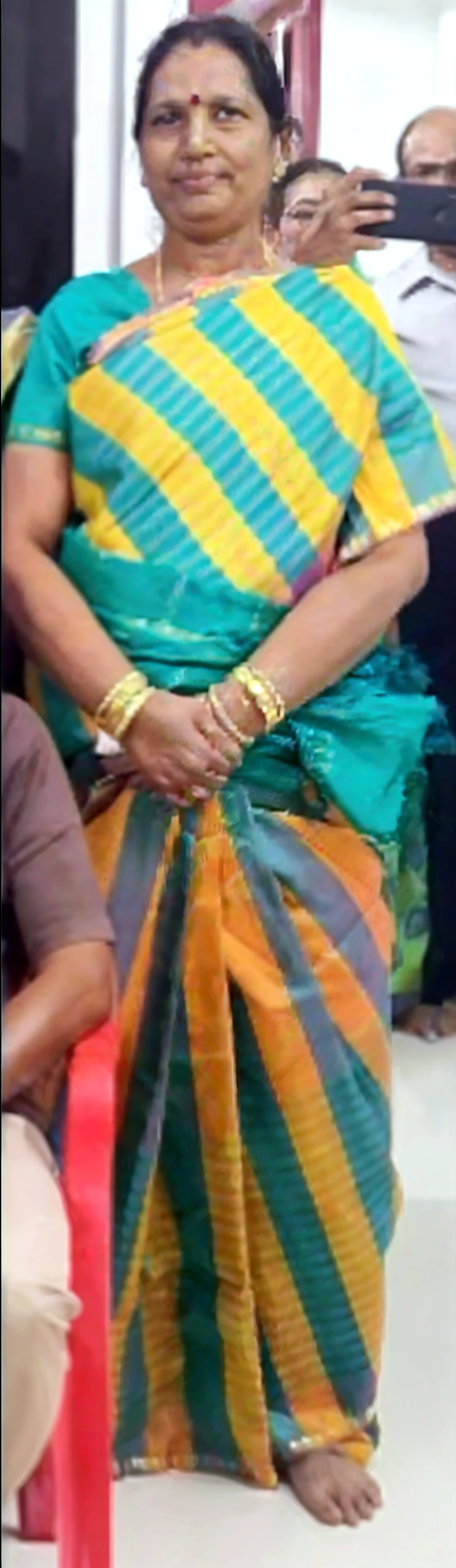 Indian housewife in saree tied to chair with ropes and tightly gagged with ball gag by four goons, realistic art