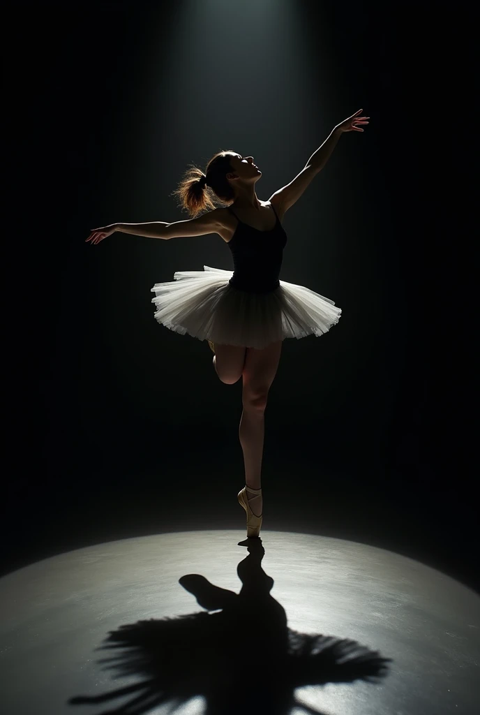 a female figure, in a ballet pose, on a completely black background. The light that falls on it projects a shadow on the floor that transforms into the silhouette of a swan with its wings open. The contrast between the illuminated figure and the dark background is striking.. her clothes are black THE SWAN ON THE GROUND, AS IF IT WAS HER SHADOW